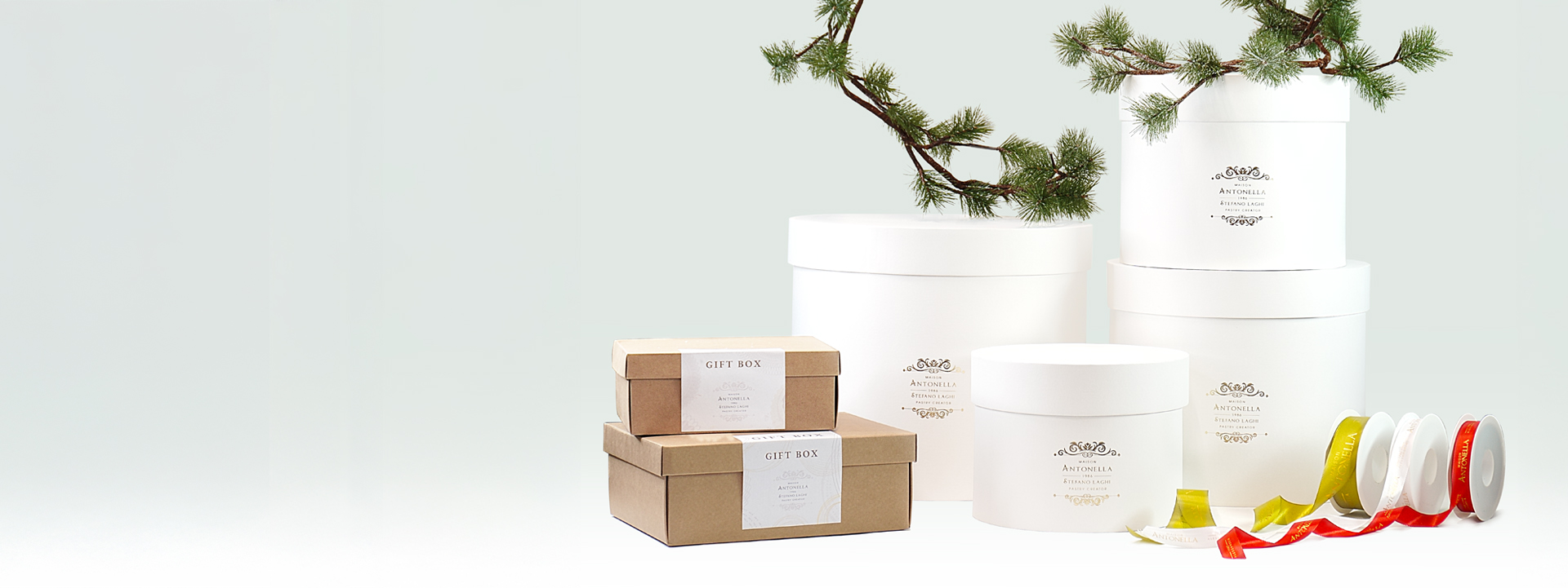 Box regalo aziendali gourmet con prodotti tipici italiani, confezioni eleganti per regali corporate e natalizi.